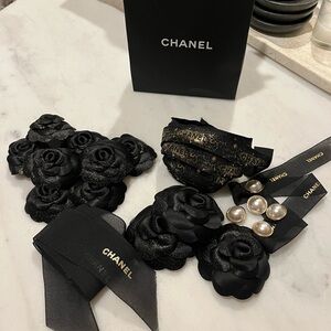 CHANEL holiday camellias and ribbon